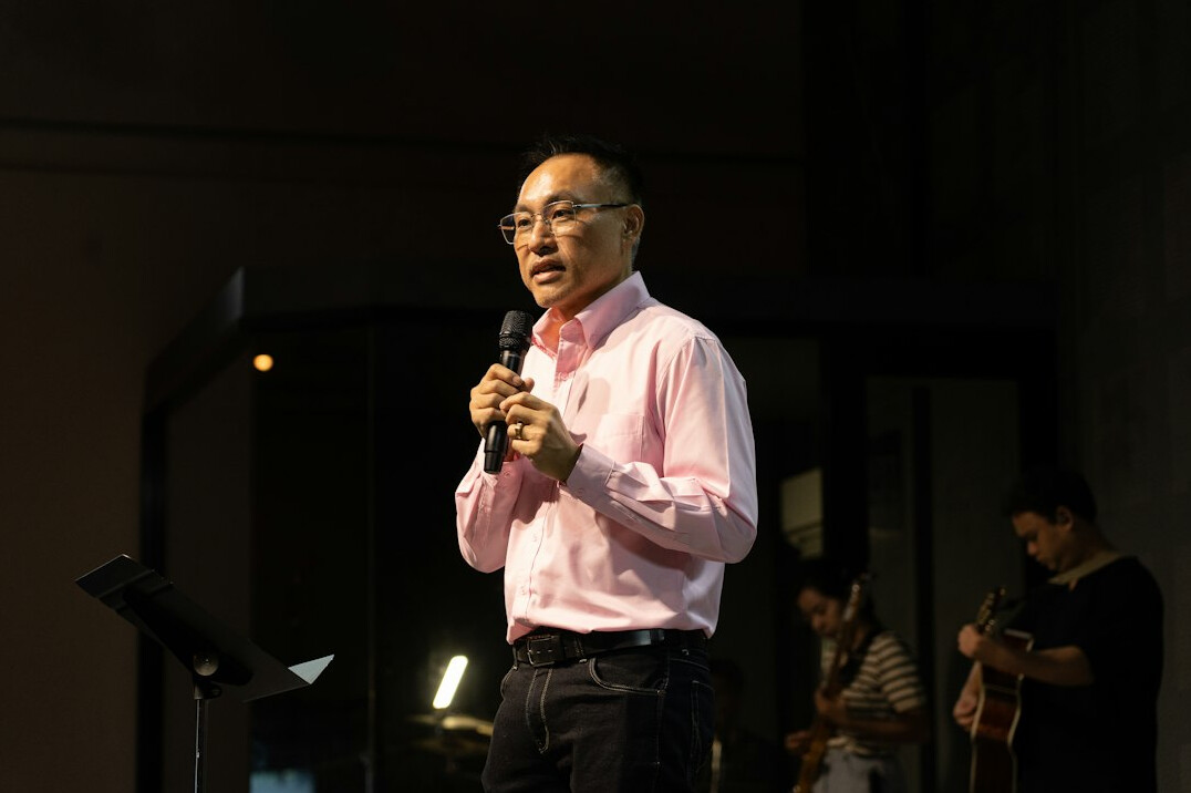 person speaking confidently on stage